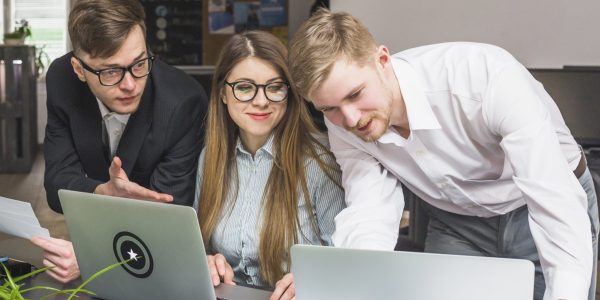 group-businesspeople-working-laptop-office-min